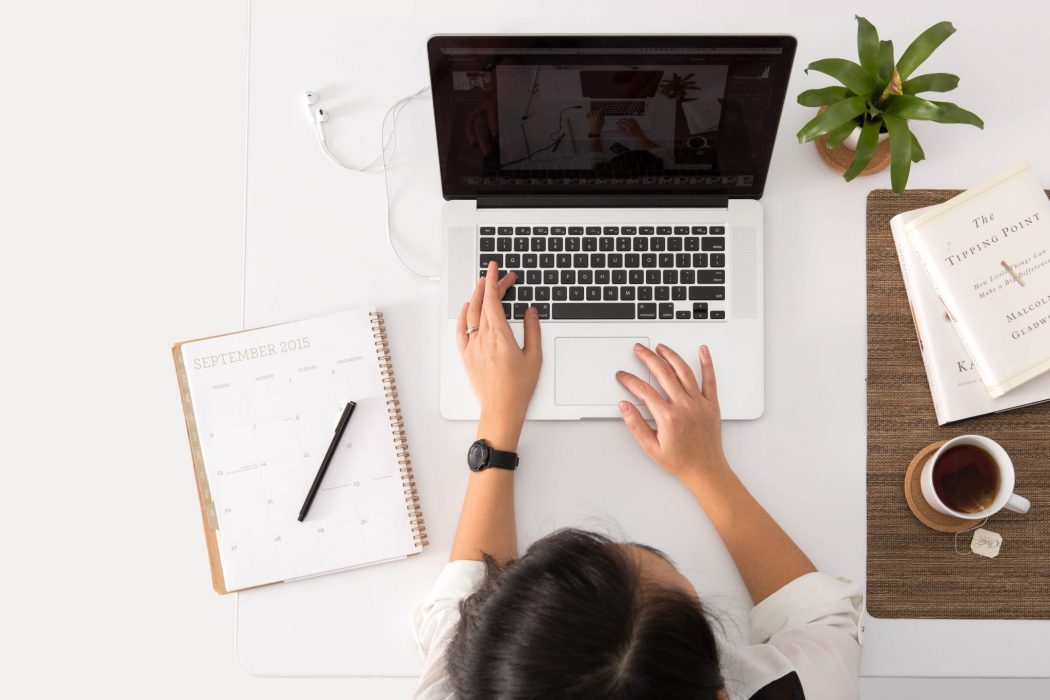 working at a desk in italy vat number
