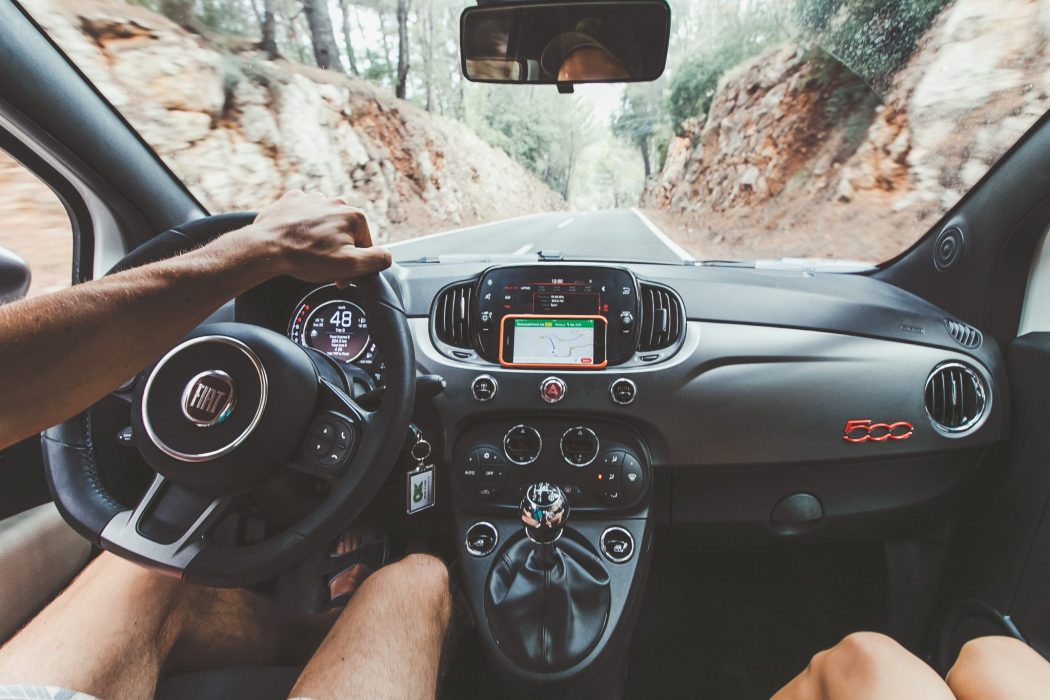 dashboard of fiat driving in italy with an Italian driver's license