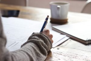 writing down and signing Italian work contracts