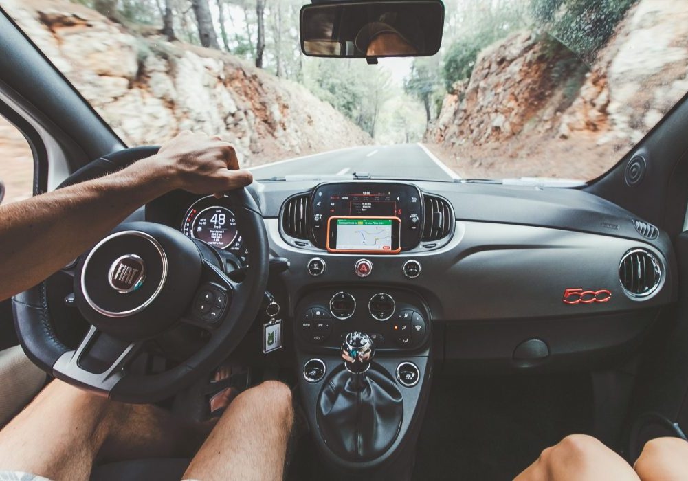 dashboard of fiat driving in italy with an Italian driver's license