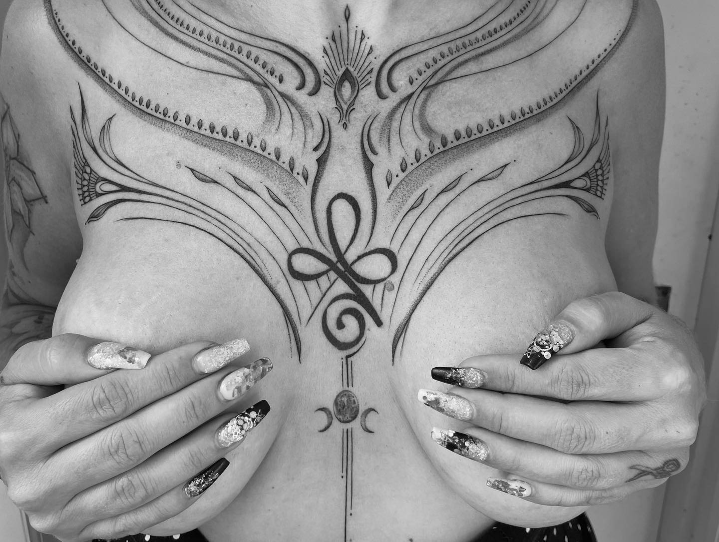 Chest piece tattoo line work