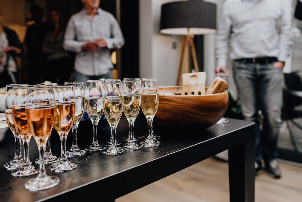 Event Management. Glasses full of wine and champagne