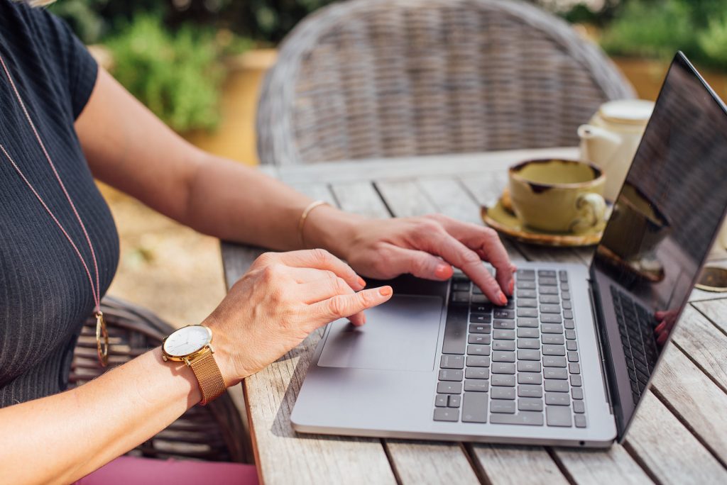 Woman on laptop setting goals