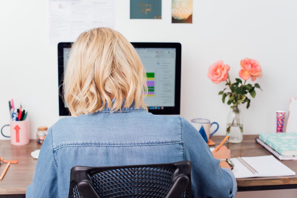 Virtual Assistant sitting at desk.